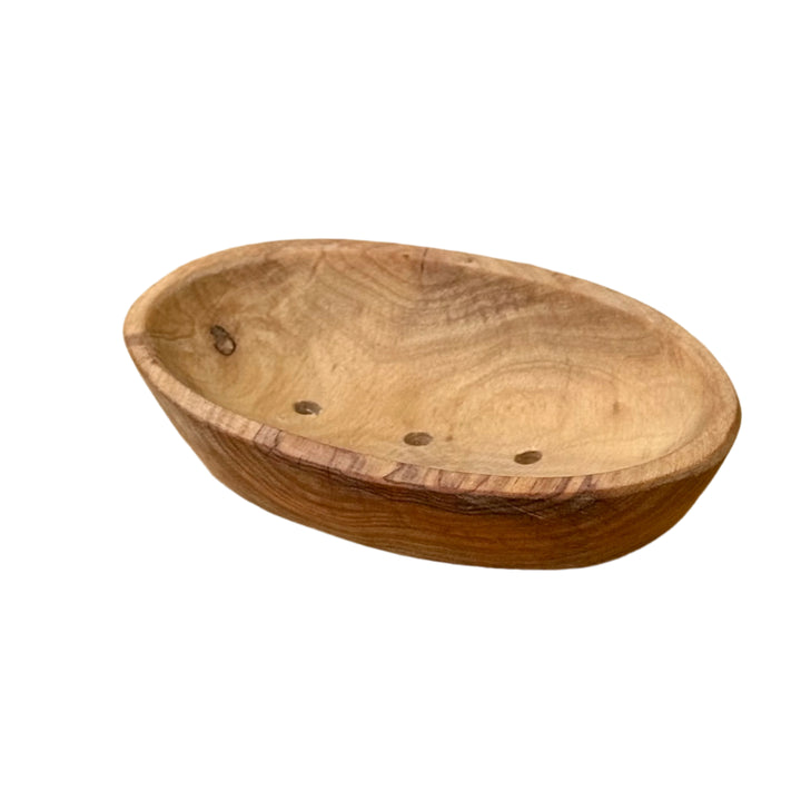 small wooden dish sitting on a white background