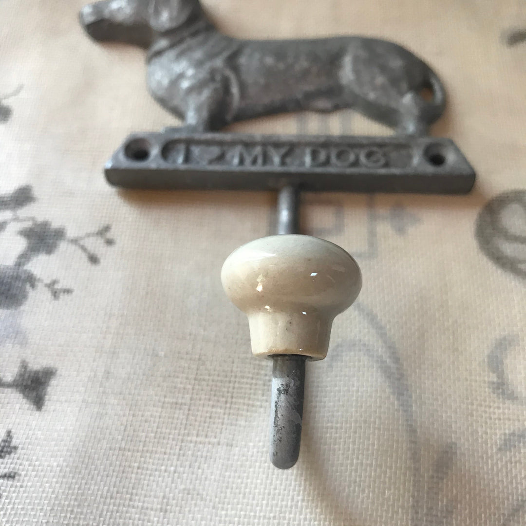 Vintage Hare dachshund dog shaped metal wall hook with cream ceramic knob and "I Love My Dog" inscription.