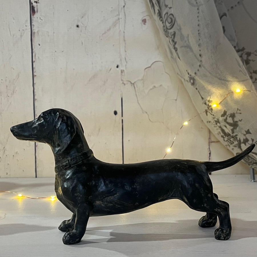 Vintage Hare polyresin Dachshund figurine with distressed antique bronze finish and detailed collar. 26cm long