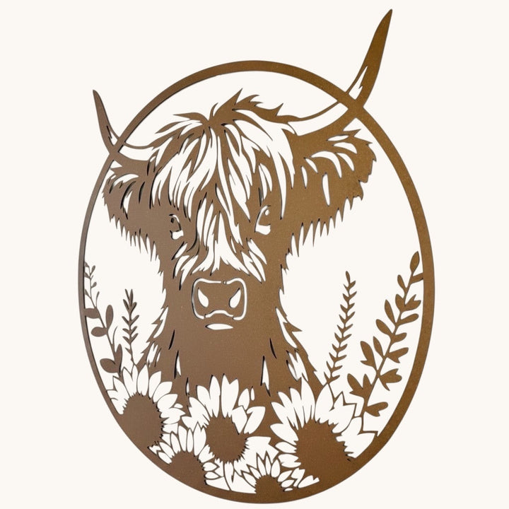 Vintage Hare large circular metal wall plaque featuring a rustic rusty Highland cow surrounded by sunflowers