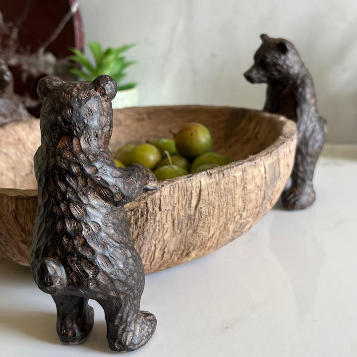 Vintage Hare rustic brown bears centrepiece bowl made from resin with a wood-look finish, holding green fruit.