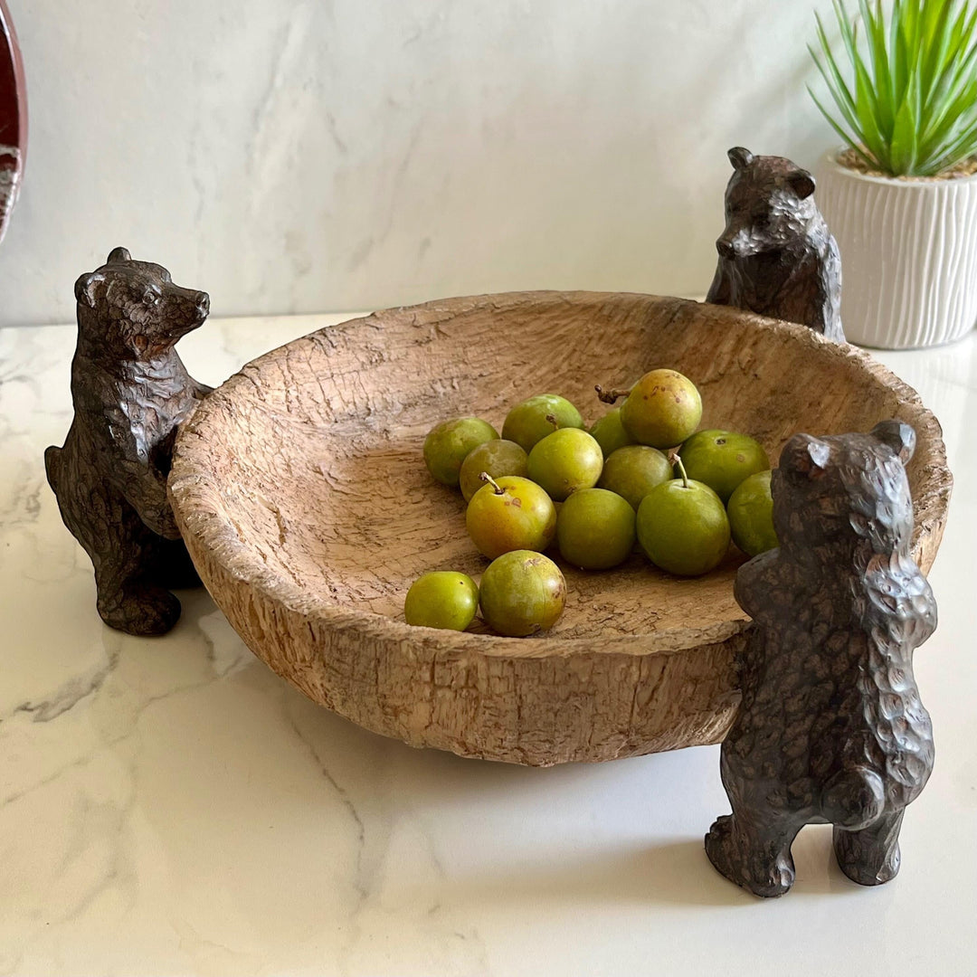 Vintage Hare rustic brown bears centrepiece bowl made of resin with wood effect, holding green fruit.