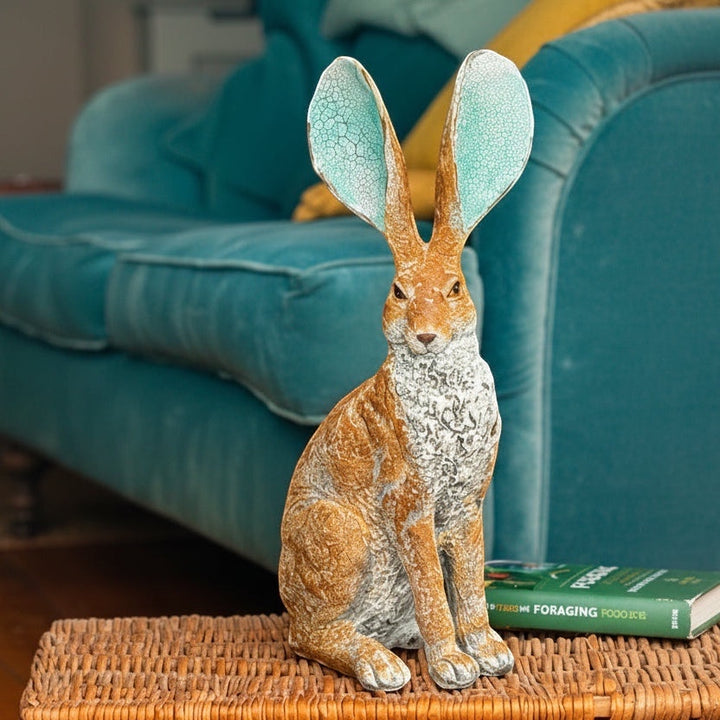Vintage HareHere's a rustic, textured resin hare ornament with large ears featuring a pale turquoise crackle finish. 41cm tall.