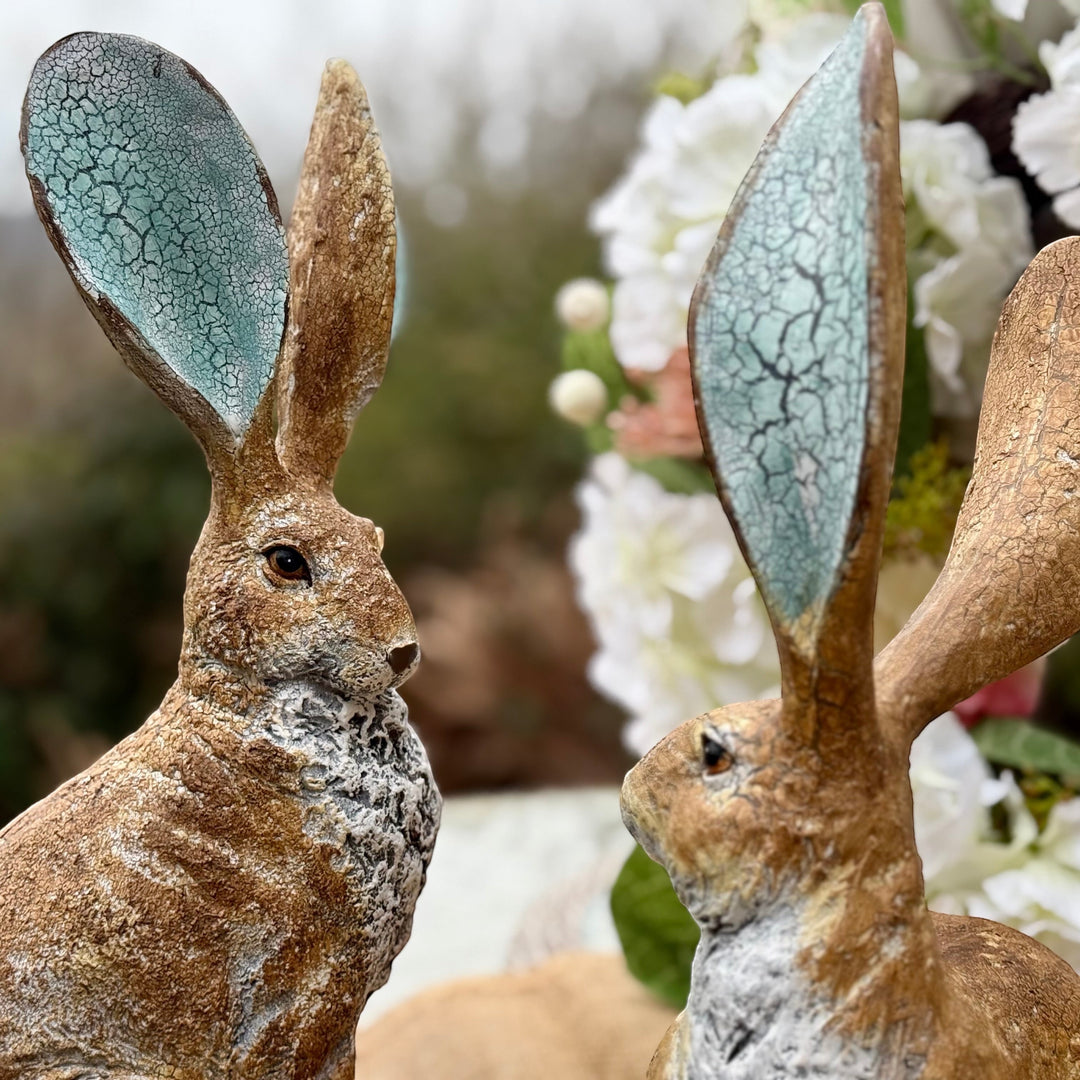 Vintage HareHere's a rustic resin hare ornament with a textured finish and turquoise crackle inside its ears. 41cm tall.