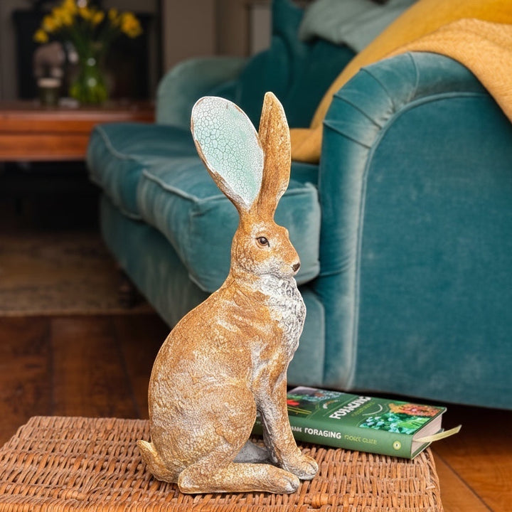 Vintage Hare rustic resin hare ornament with turquoise crackle ears, 41cm tall, sitting on a woven stool.