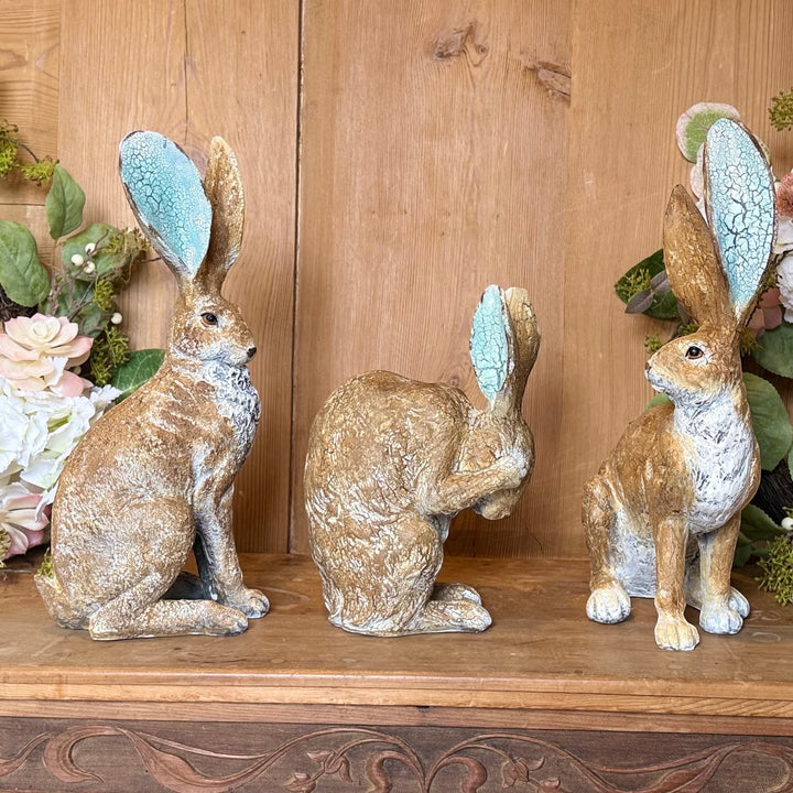 Vintage Hare rustic resin hare ornament with turquoise crackle ears, 41cm tall. Rustic textured finish.