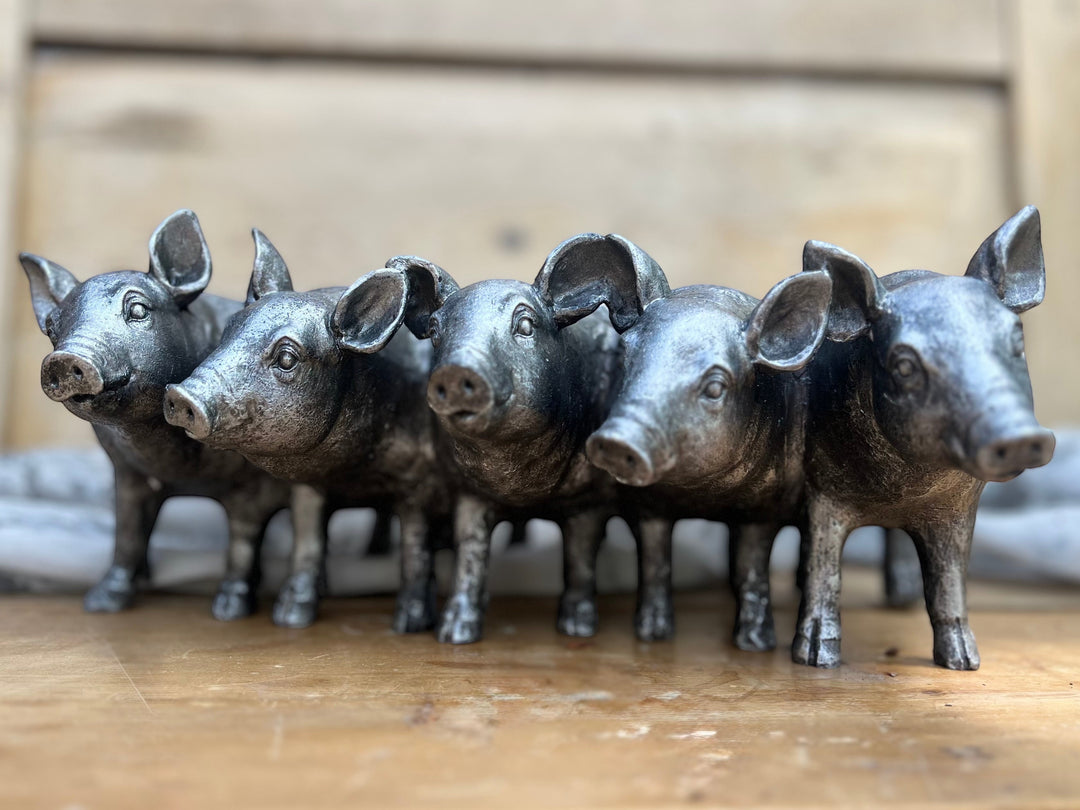 Vintage Hare Silver Pigs Planter with five pigs in a row, antique silver finish, resin, 30cm wide.