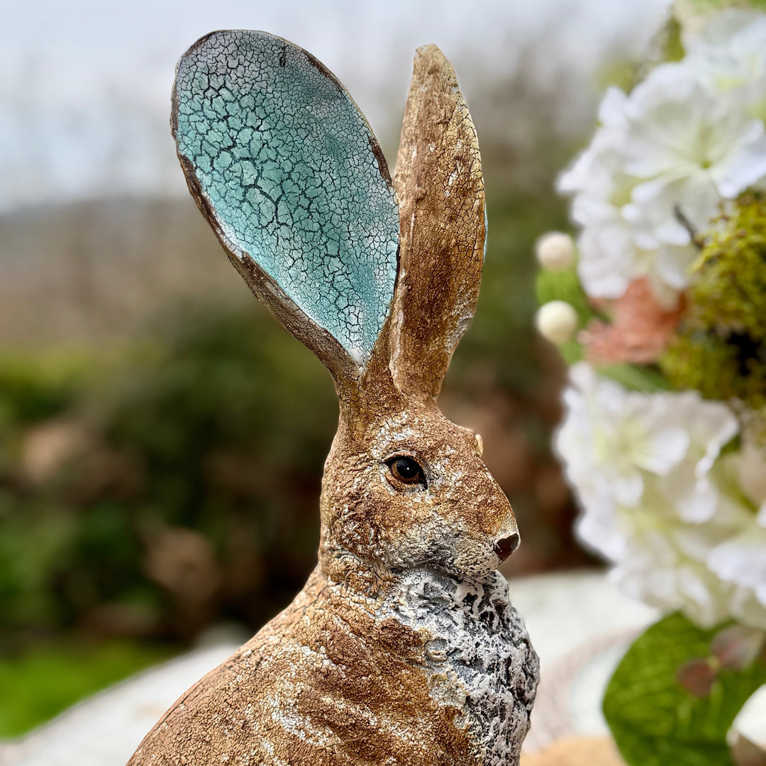 Vintage HareHere sculpted resin hare ornament with rustic texture and turquoise crackle finish inside ears. 41cm tall.